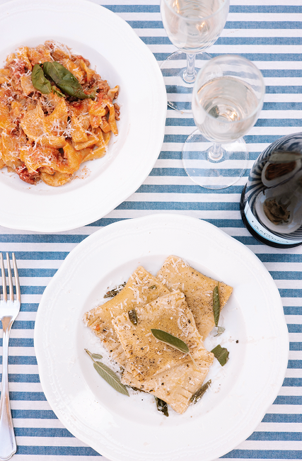 Pasta dish with herb garnish